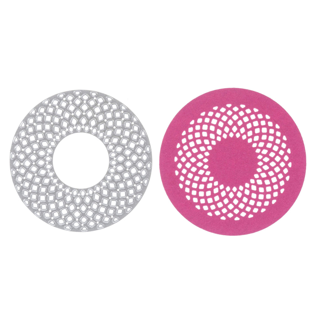 Ein Paar rosa und silberne Kreise von Stanzenschop.de auf weißem Hintergrund.