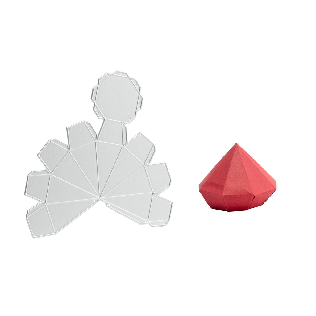 Eine rot-weiße dreieckige Form auf einer weißen Oberfläche, die einer Stanzschablone Kleine Diamantschachtel von Stanzenshop.de ähnelt.