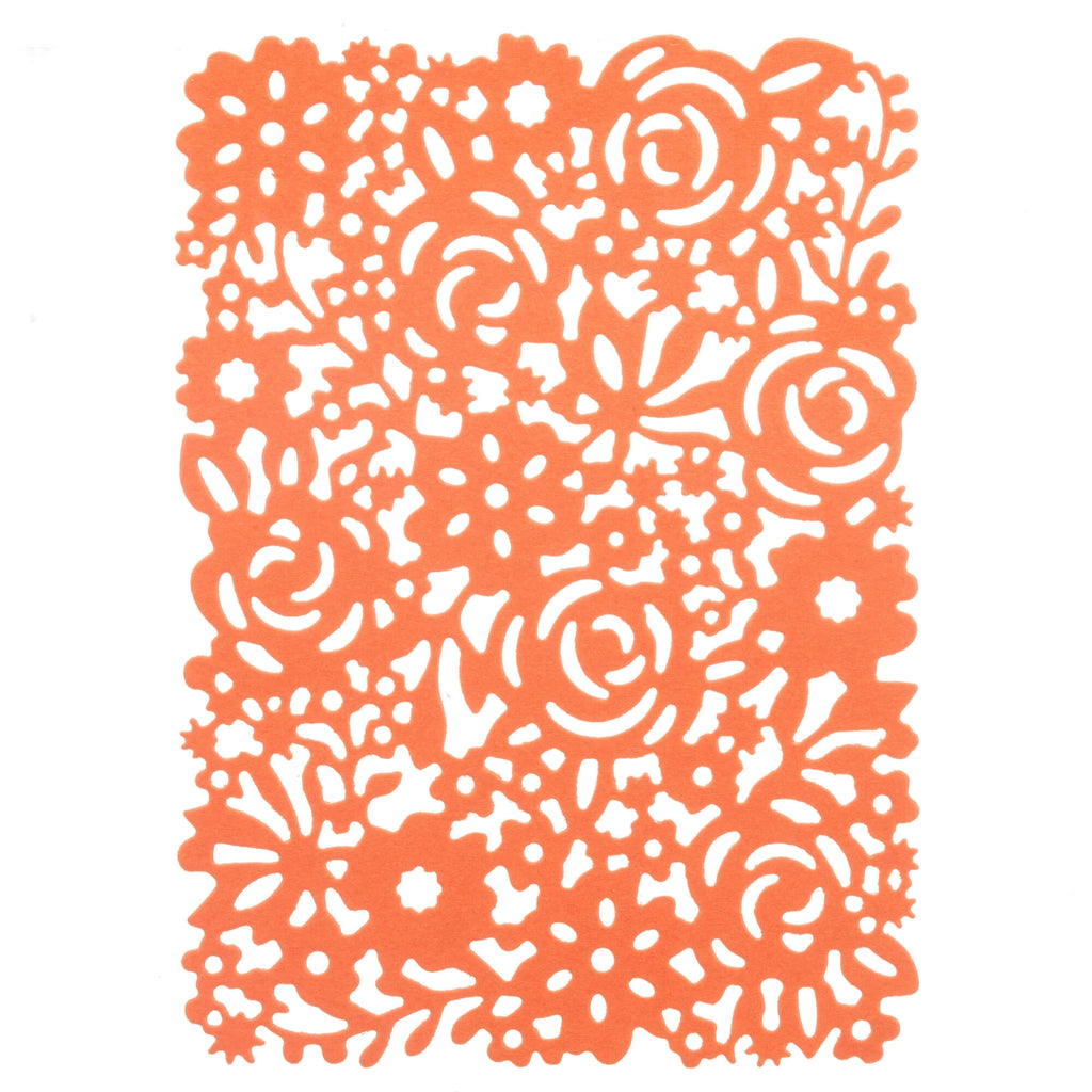 Eine orangefarbene Stanzschablone: Blumenmusterpapier von Stanzenshop.de mit floralen Motiven darauf.