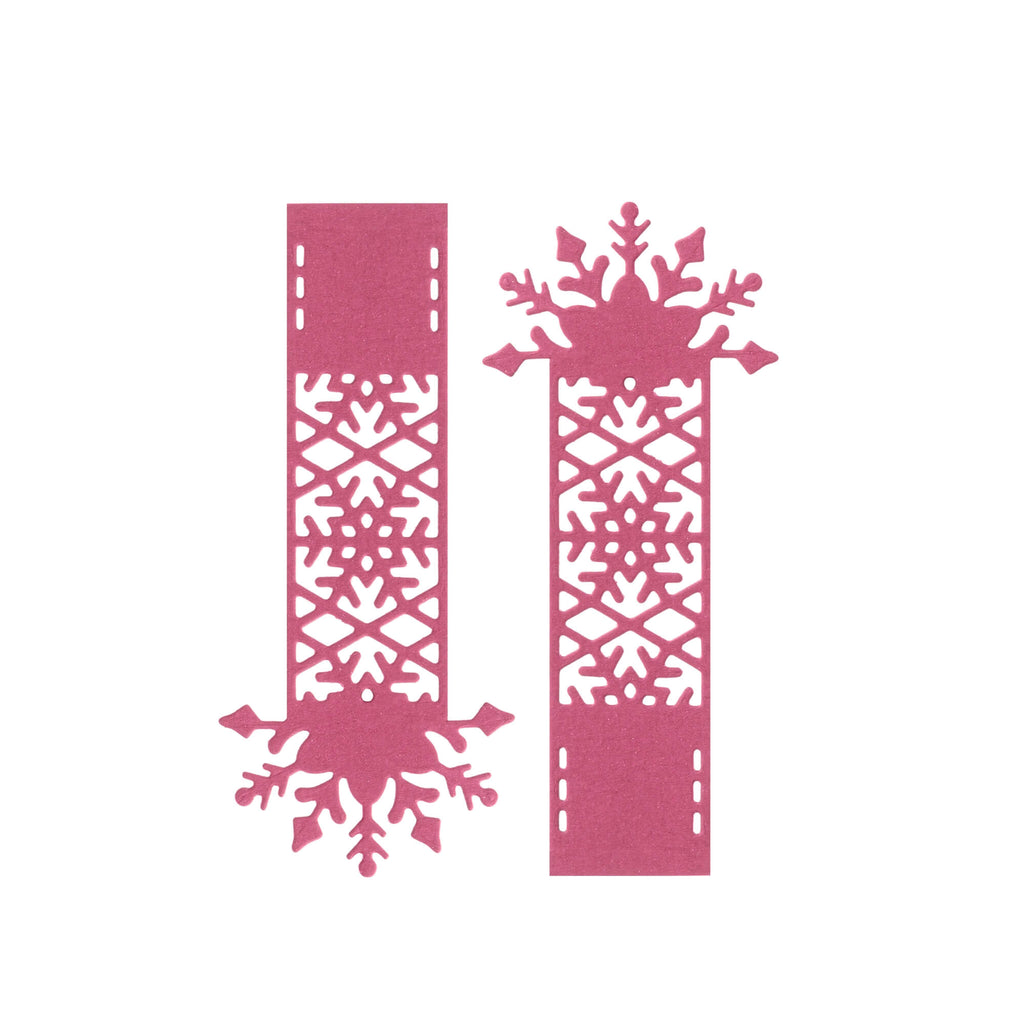 Ein Paar rosa Stanzschablonen Schneeflockenbänder mit Wintermotiv von Stanzenshop.de.