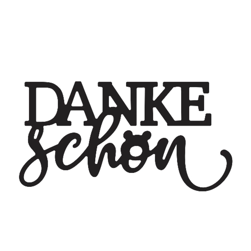 Das Bild zeigt den Text „danke schön“ in einer stilisierten schwarzen Schriftart auf weißem Hintergrund, erstellt mit dem Sizzix Mundart Stempel • Stanzschablone deutscher Text.