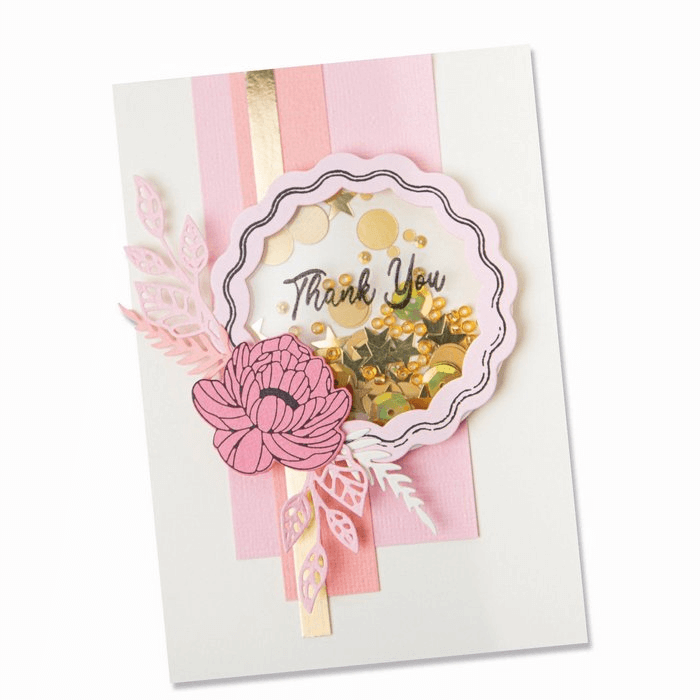 Eine Dankeskarte von Sizzix mit rosa Blumen und Goldfolie.