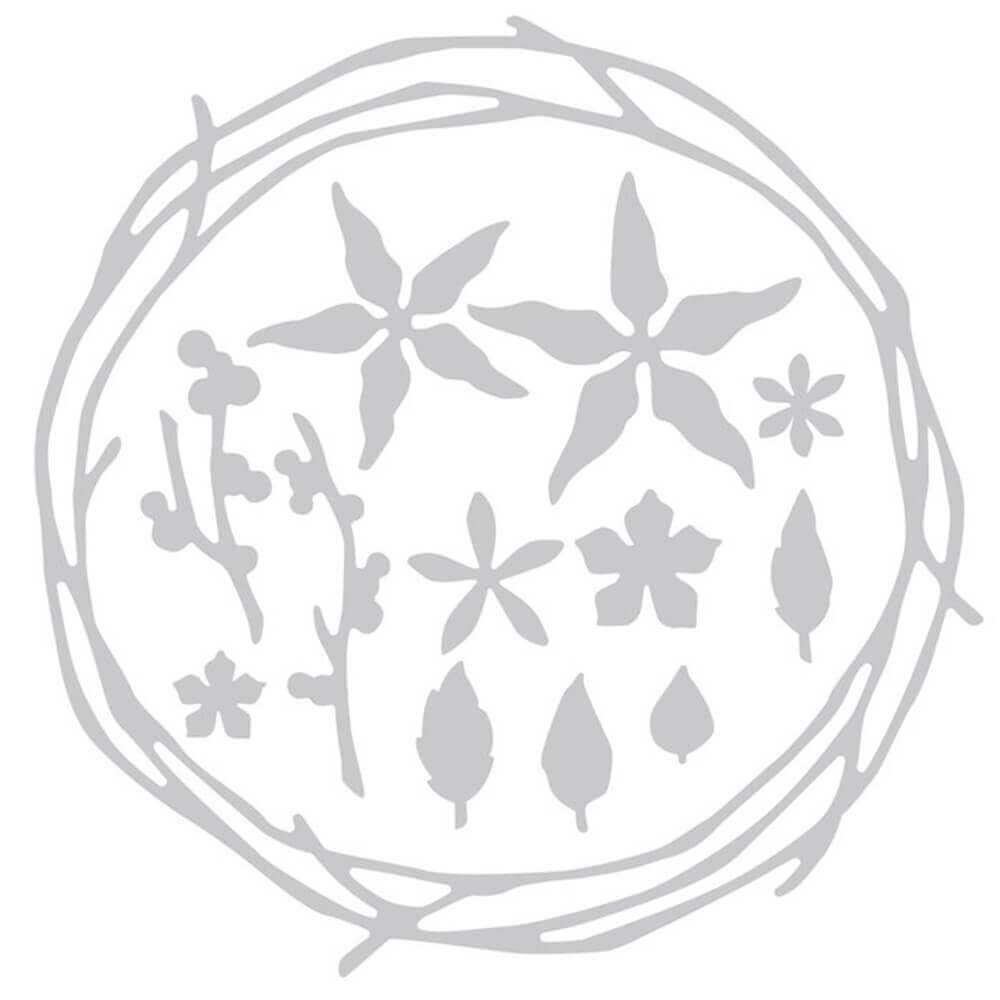 Ein Sizzix • Thinlits Stanzschablone schöner Kranz Set x13 mit Blättern und Zweigen darin.