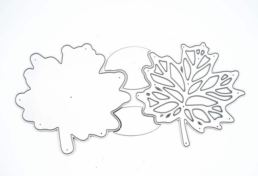 Zwei Stanzschablonen: Blatt mit Rahmenausschnitte auf weißem Hintergrund.