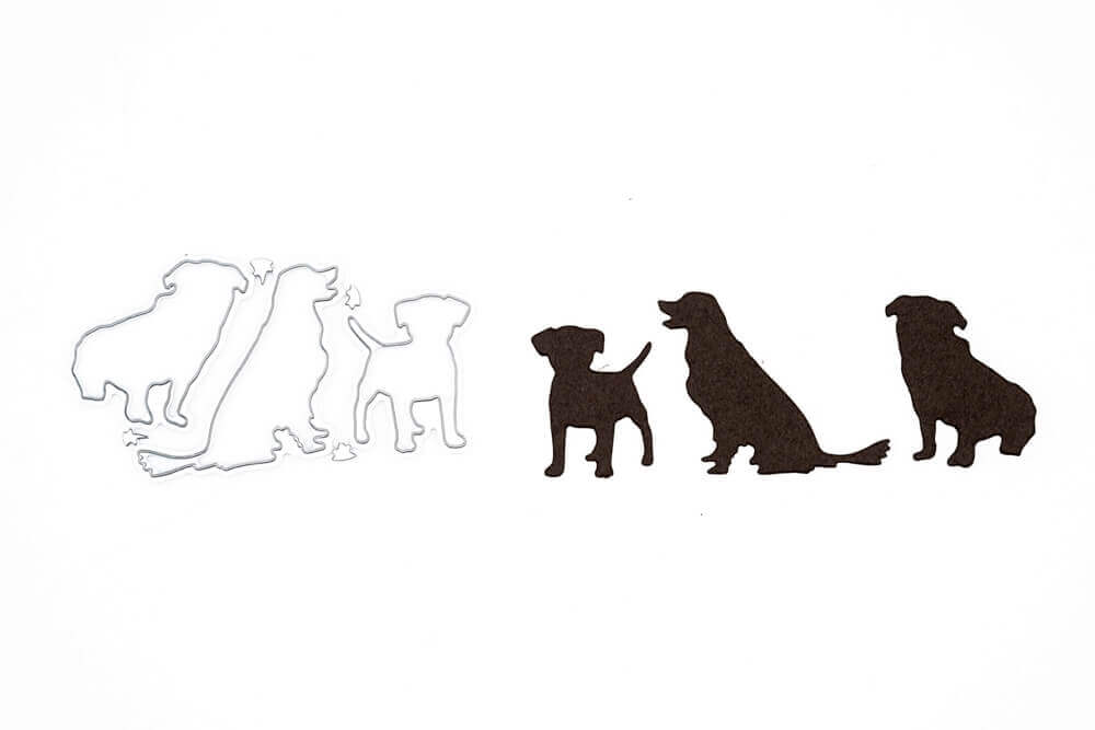 Ein Stanzschablone-Bastelergebnis mit drei Hunden, dargestellt als Silhouetten, auf einem weißen Hintergrund von Stanzenshop.de.