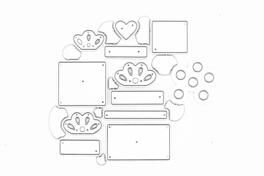 Drei sortierte "Stanzschablone: Drei verschiedene Geschenke" Metallstempel von Stanzenshop.de, mit Geschenkformen auf weißem Hintergrund - ideal zum Basteln einer einzigartigen Geburtstagskarte.