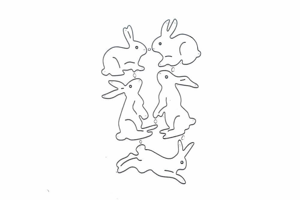 Eine Zeichnung von Stanzschablone: Fünf verschiedene Hasen auf weißem Hintergrund von Stanzenshop.de.
