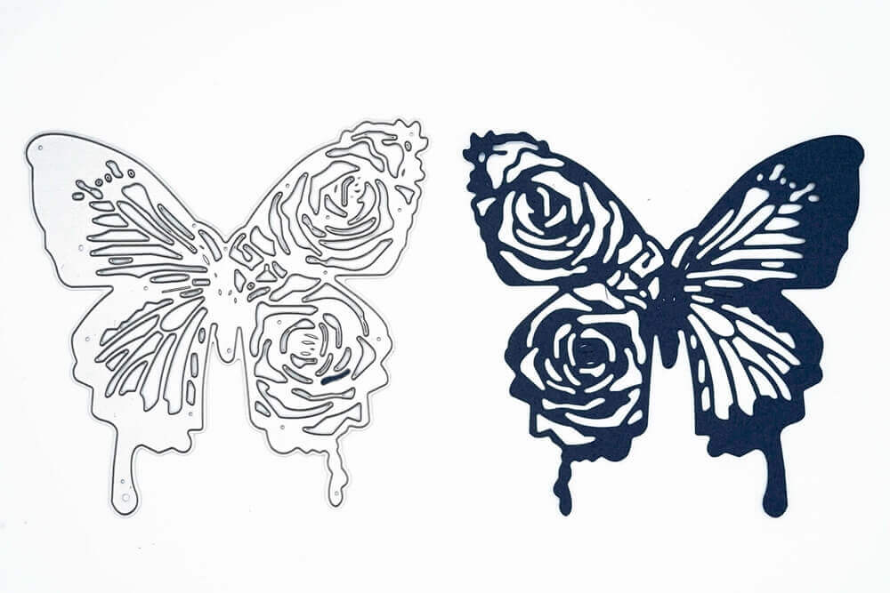 Eine Stanzschablone Großer Schmetterling und eine Rose auf weißem Hintergrund. (Stanzenshop.de)