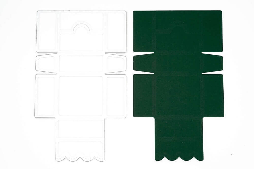Ein Paar Stanzschablone Schachteln mit Verschluss von Stanzenshop.de auf weißem Untergrund, perfekt geeignet für ein Bastelset-Projekt.