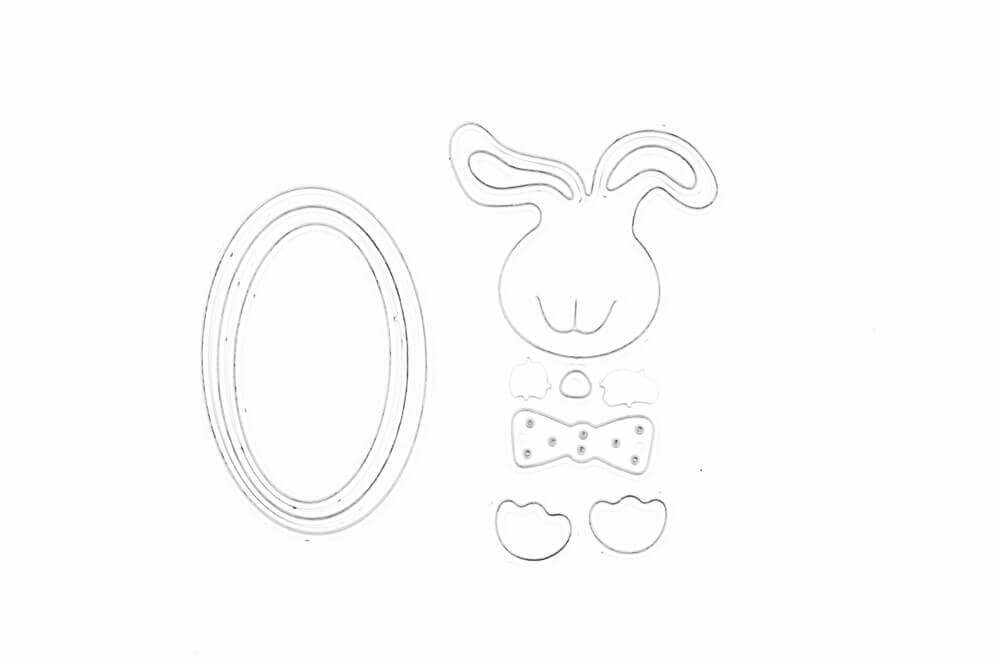 Gestalten Sie niedliche Hasengesichter mit der Stanzschablone: Süßer Osterhase von Stanzenshop.de enthält einen ovalen Rahmen und Einzelteile (Ohren, Kopf, Wangen, Nase, Fliege, Pfoten). Ideales Basteln Ostern Zubehör auf einem weißen Hintergrund.