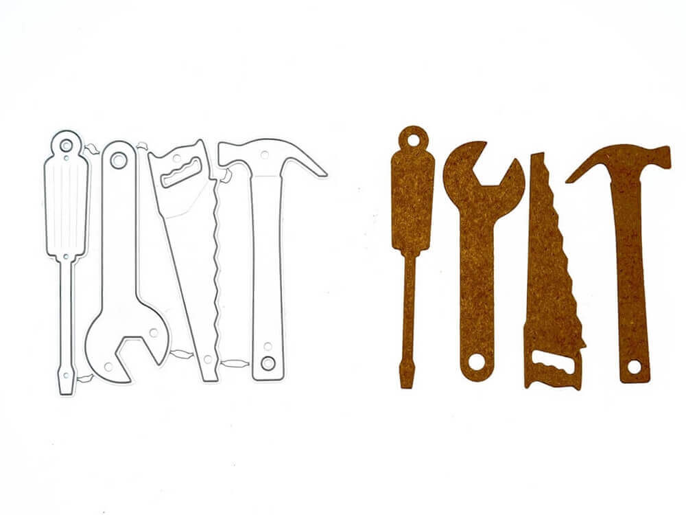 Auf weißem Hintergrund ist eine Gruppe von Stanzschablonen Vier Werkzeuge, Tool, Hammer, Säge, Schraubenzieher von Stanzenshop.de abgebildet.