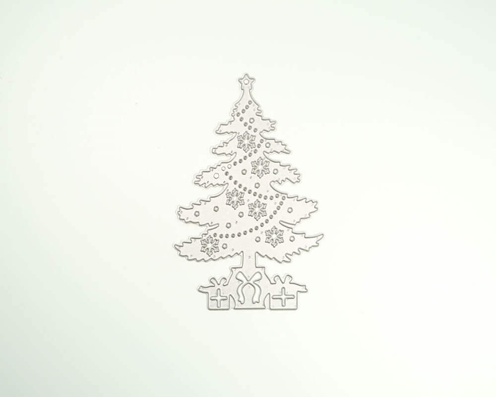 Ein Bild der Stanzschablone: Weihnachtsbaum mit Geschenken von Stanzenshop.de auf einer weißen Fläche.
