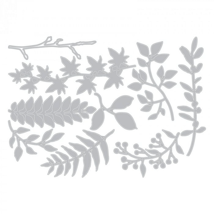 Ein Satz Sizzix-Blätter und -Zweige auf weißem Hintergrund.