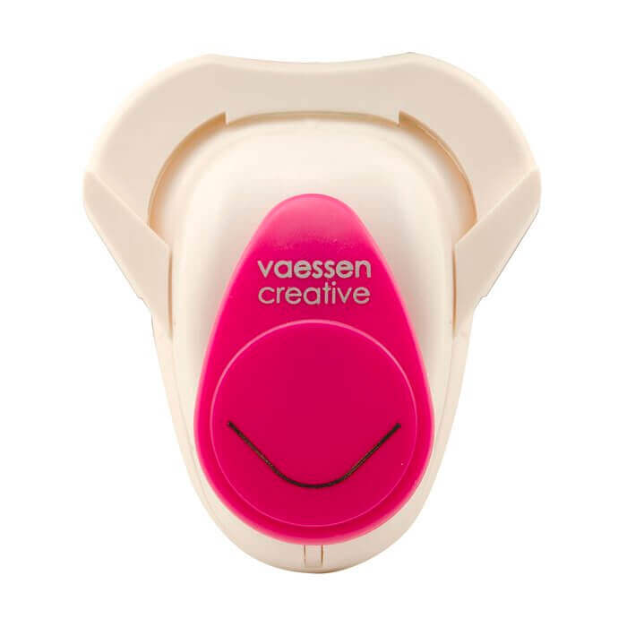 Ein rosa-weißer Schnuller mit der Aufschrift „vossen creative“ im Stanzschablonen-Design.
